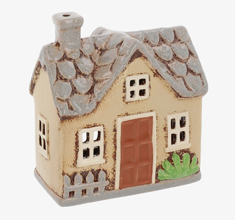 Bild av dekorativ ljuslykta i form av charmigt keramikhus