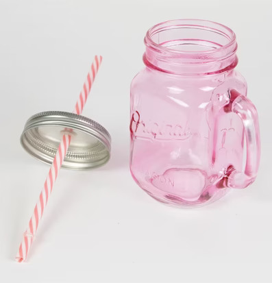 Bild av charmig rosa dryckesburk med vintage design