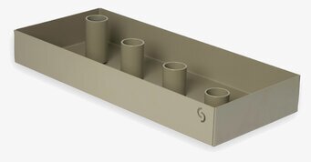 Bild av grön rektangulär ljusstake i avskalad modern design