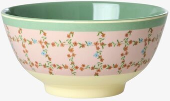 Bild på dekorativ skål med pastell och blommigt mönster