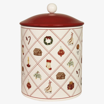 Bild av rund plåtburk med julmotiv och rött lock för förvaring
