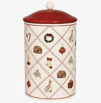 Bild av julig plåtburk med rutmönster och röda detaljer