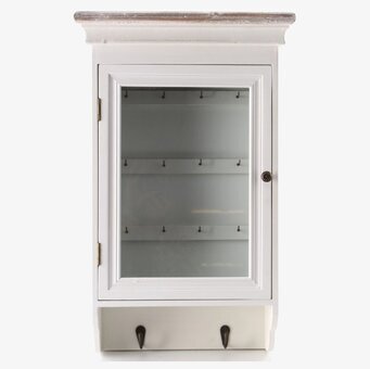 Foto av stilrent nyckelskåp med glasdörr och krokar