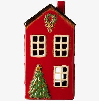 Bild av röd keramiklykta formad som hus med juldekorationer