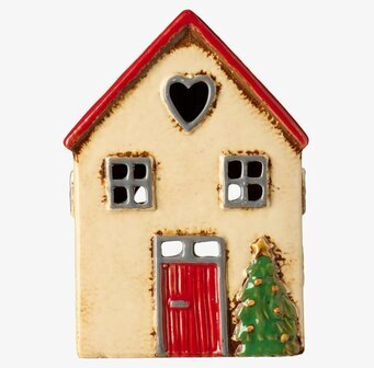 Bild av dekorativ keramiklykta format som hus med julgran