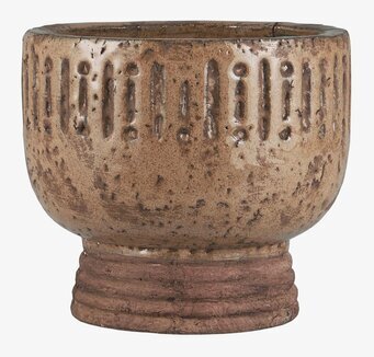 Bild av rustik brun pokalkruka med relief och räfflad fot