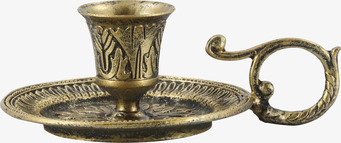 Bild på antik ljusstake i mässing med dekorativt handtag