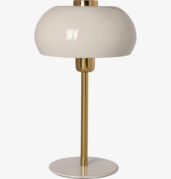 Bild på elegant bordslampa i vit och mässing med oval skärm