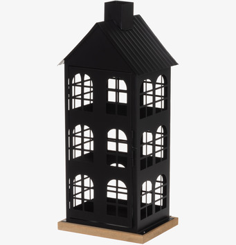 Bild på dekorativ ljuslykta som liknar ett klassiskt radhus