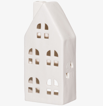 Bild av vit ljuslykta i keramik formad som stilrent hus