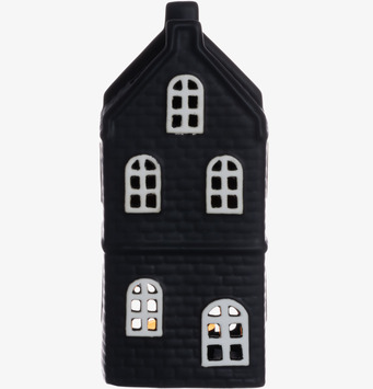 Bild på dekorativ svart ljuslykta formad som stadshus