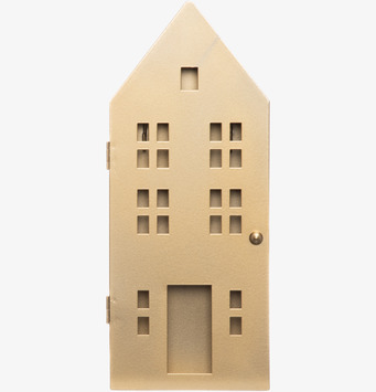 Bild på nyckelskåp i husform med guldig matt yta och fönster