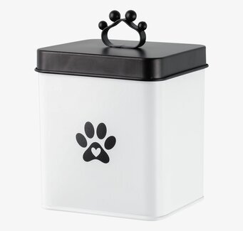 Bild på vit plåtburk med svart tassmotiv och metallhandtag