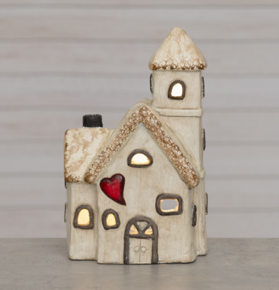 Bild på dekorativt keramikhus med LED-belysning och hjärtdetalj