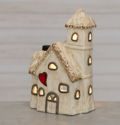 Bild av keramikhus med LED-belysning och rött hjärta