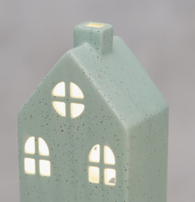 Bild av dekorativt grönt keramikhus med LED-belysning