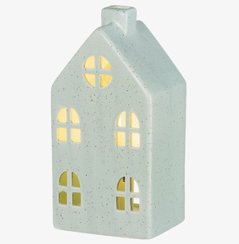 Bild på dekorativt keramikhus med LED-belysning och grönt tak