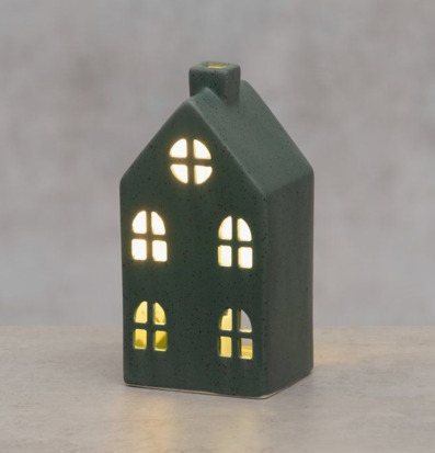 Bild på dekorativt mörkgrönt keramikhus med LED-belysning