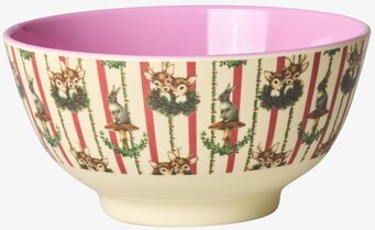 Bild på färgglad skål med djurmotiv och rosa insida