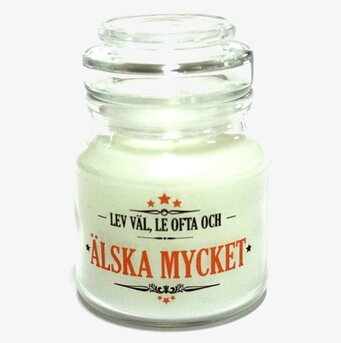 Bild av elegant ljus i glasbehållare med inspirerande text