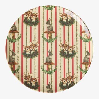 Bild på desserttallrik med djurmotiv, ränder och skogstema