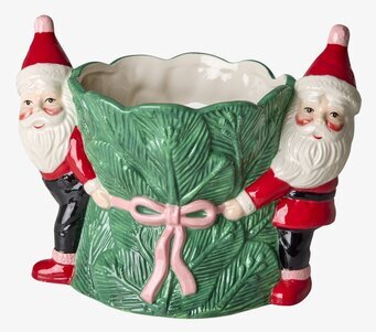 Bild på dekorativ keramikkruka med tomtar och grön säck