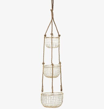 Bild på hängande förvaring med tre guldfärgade metallkorgar