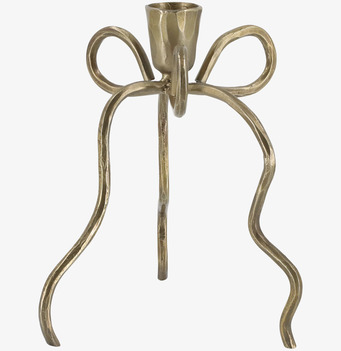 Bild av stor ljusstake i antik mässing med rosett och ben