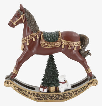 Bild av dekorativ gunghäst med julgran och vit björn 
