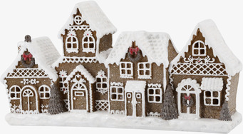 Bild av klassiskt pepparkakshus med snö och juldekorationer