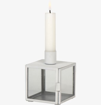 Foto av stilren vit ljuslykta med glas och metallram