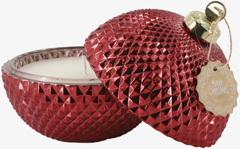 Bild av röd jullykta med ljus och gulddetaljer – juldekor