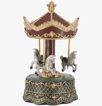 Bild av klassisk speldosa med detaljerad karusell och hästar