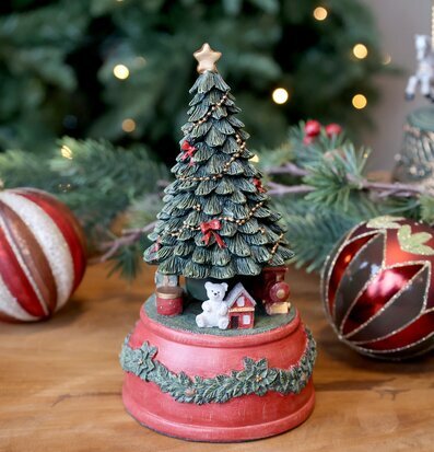 Bild av dekorerad speldosa med klassiskt julgransmotiv