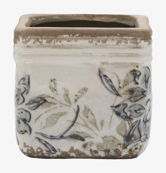 Bild på fyrkantig keramikkruka med botaniskt mönster och patina