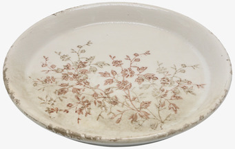 Bild av keramikfat med blommönster och patinerad glasyryta