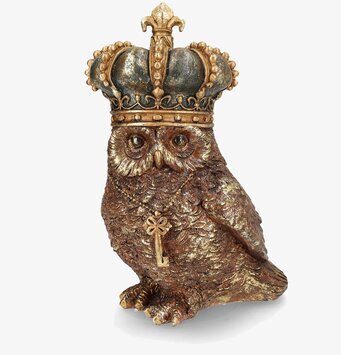 Bild på dekorativ uggla med krona och nyckel i brunt och guld