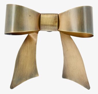 Bild av dekorativ väggrosett i borstad metall med guldton