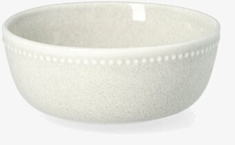 Bild på ljus skål med prickig kant och matt texturerad yta