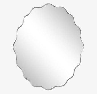 Bild på vågig väggspegel med rostfri ram och reflekterande glas