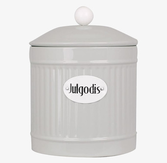 Bild på beige plåtburk för julgodis med räfflad struktur