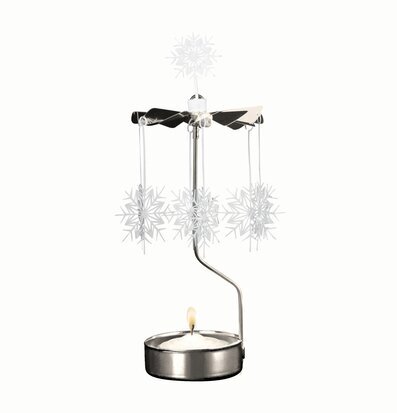 Bild på dekorativt änglaspel med vita stjärnor och metall