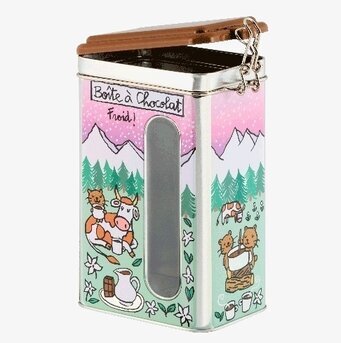 Bild på färgglad plåtburk med naturmotiv och lekfull design