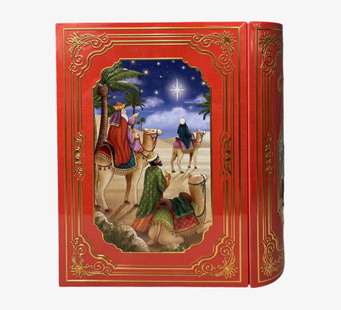 Bild av julburk som ser ut som bok med stjärna och ökenscen