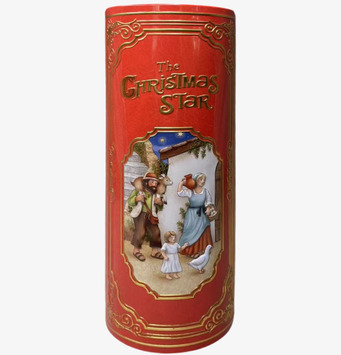 Bild av klassisk plåtburk med julmotiv och gyllene detaljer