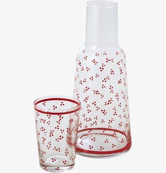 Bild: Stilren karaff och glas med lekfullt mönster