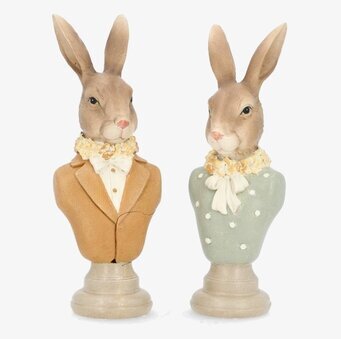 Foto: Två kaninbyster i beige och grön prickig klädsel