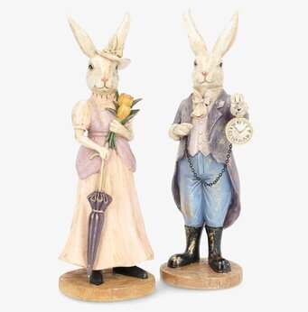Foto: Herr och fru kaninfigurer med paraply och ur