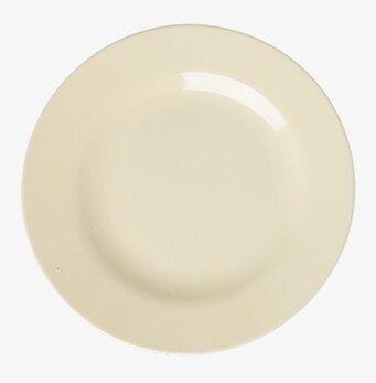 Foto på beige melaminassiett på vit bakgrund ovanifrån