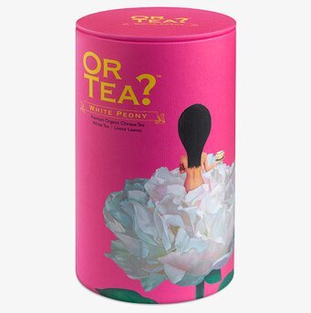 Bild av cylinderformad teförpackning med rosa design